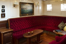The schooner Atlantic, cosy seating in the lounge area of the saloon...