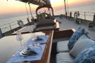 The schooner Atlantic, luxurious al fresco dining on deck...